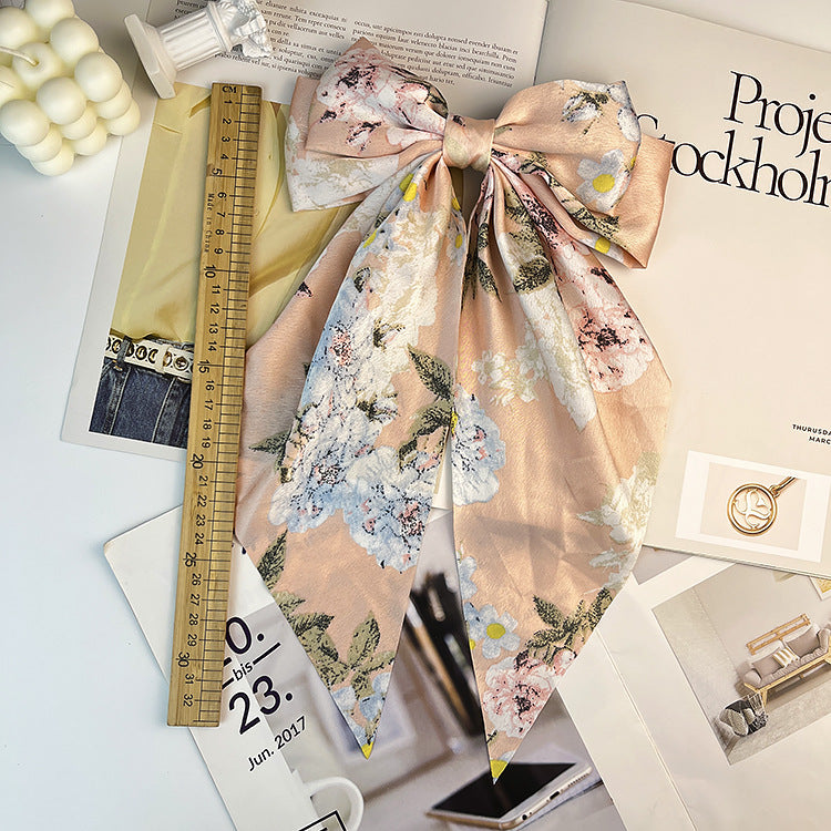 Wholesale Retro Camellia Red Big Bow Long Floating Hair Clip